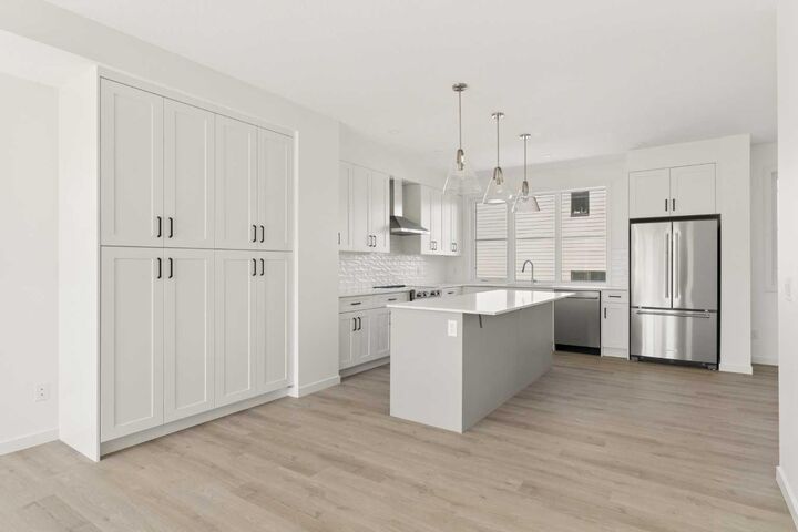 Property Photo: 1453 Naa Drive SW 90 AB T3H 6H7
