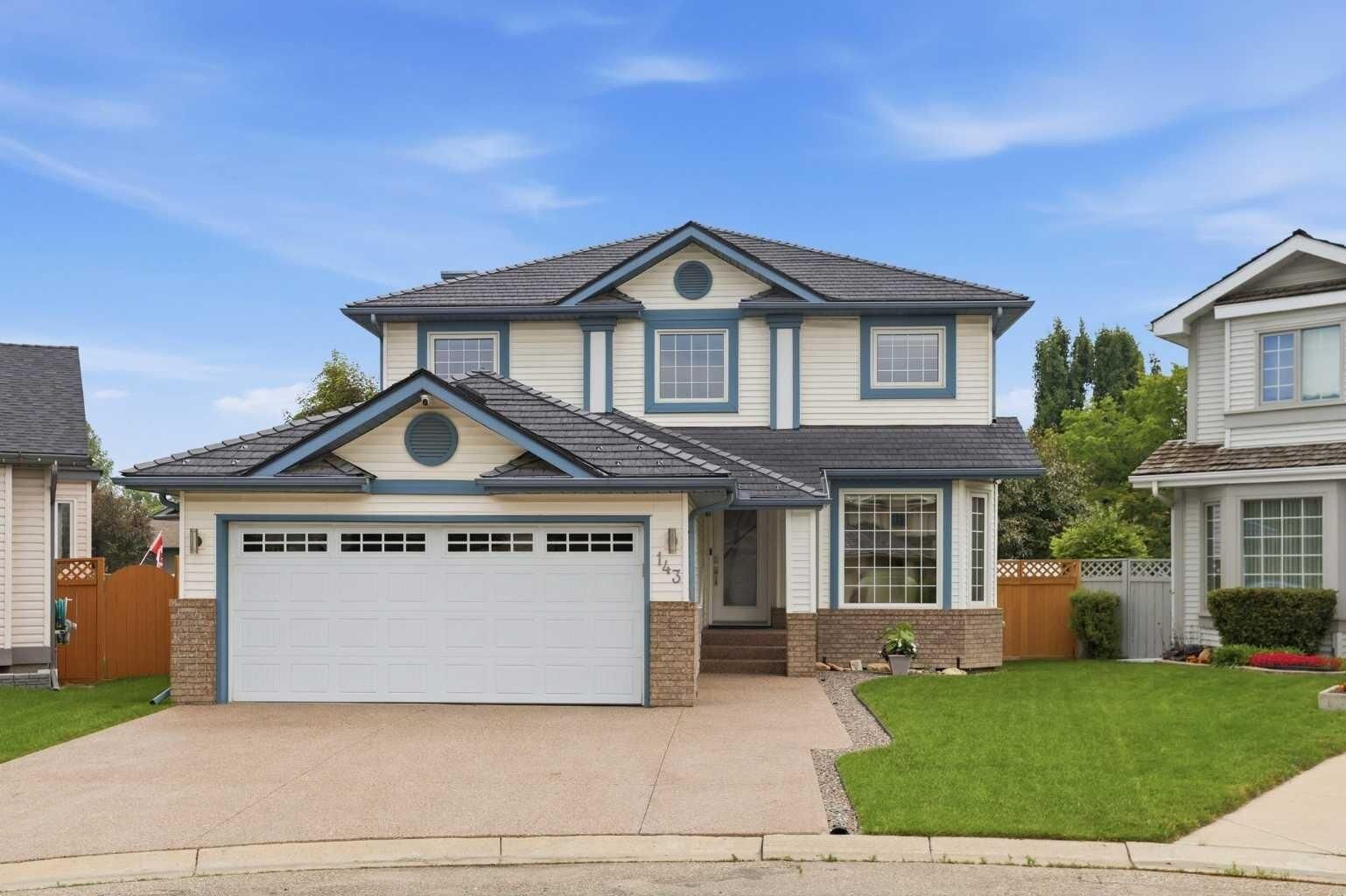 Property Photo:  143 Douglasbank Place SE  AB T2Z 2J4 