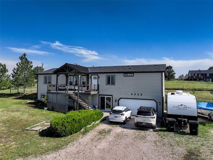 Property Photo:  6528 Bow Meadows Drive  CO 80107 