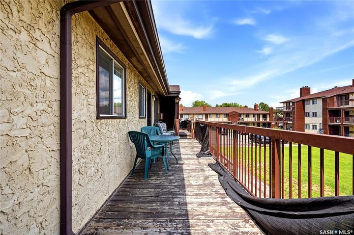 Property Photo:  15 Alport Crescent 203  SK S4R 8C6 