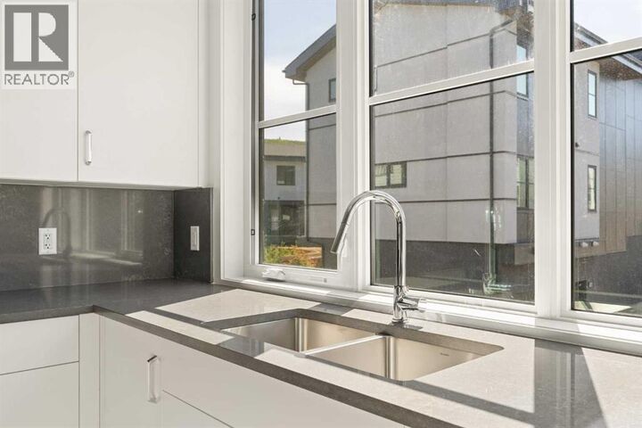 Property Photo: 1453 Na'a Drive Southwest AB T3H 6H7