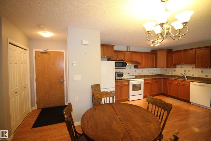 Property Photo:  7 5011 Pine Drive  AB T0A 0T0 