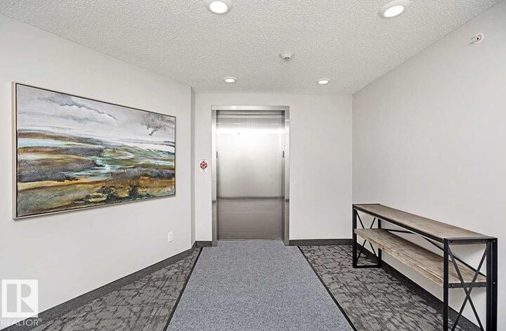 Property Photo: 11511 27 Avenue NW 207 AB T6J 7J8