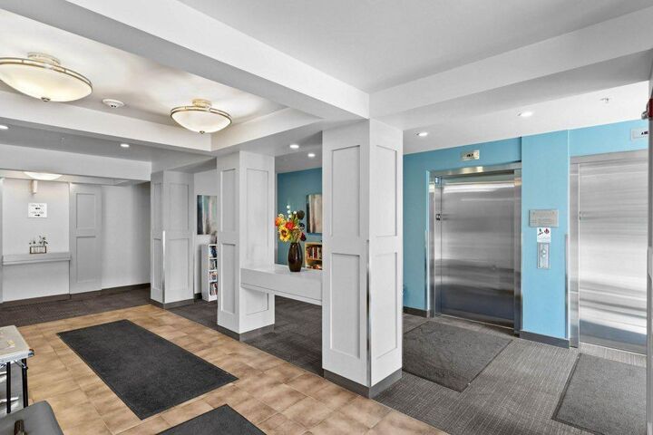 Property Photo: 201 Sunset Drive 304 AB T4C 0H5