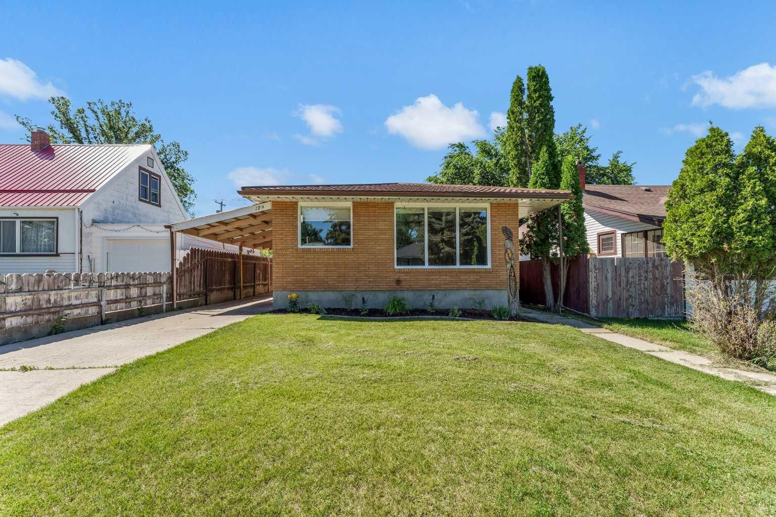 Property Photo:  129 7 Street SE  AB T1A 1J4 