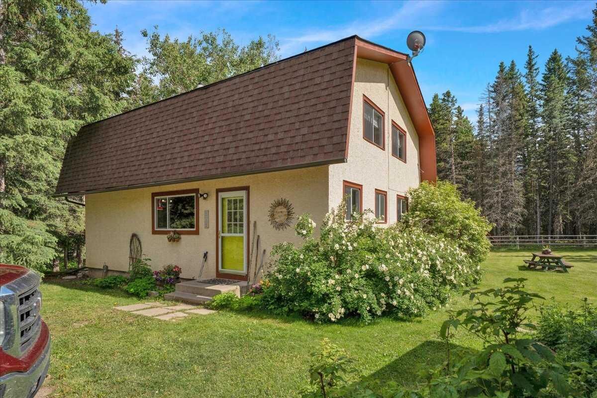 Property Photo: 304241 278 Avenue W AB T0L 1K0