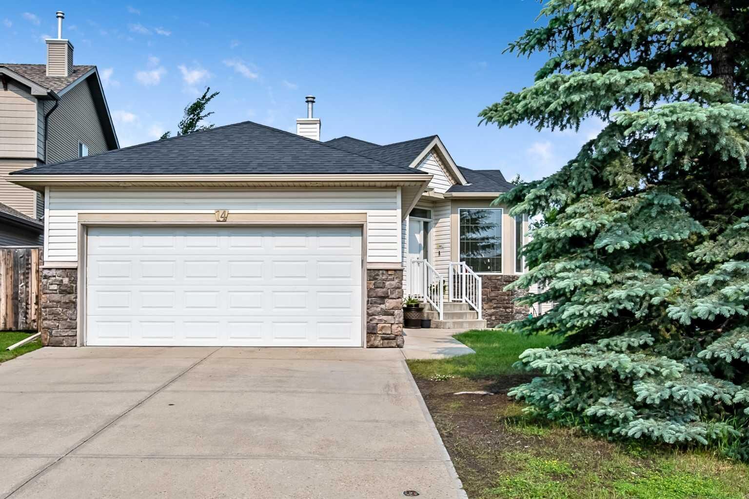 Property Photo: 14 Cimarron Park Cove AB T1S 2L8