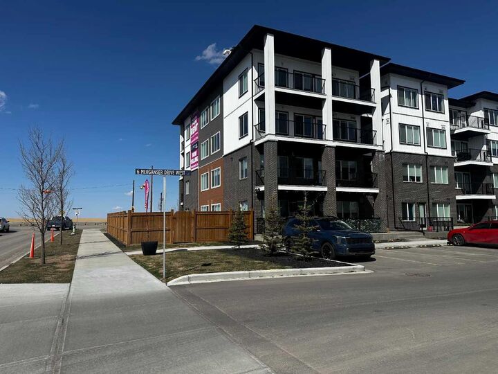 6 Merganser Drive W 4102 — photo 1