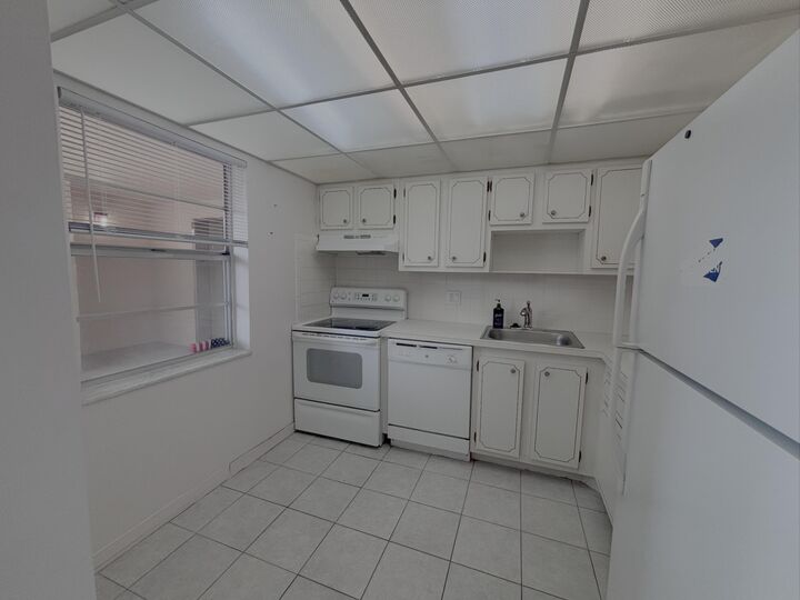 Property Photo:  1015 Country Club Drive 205  FL 33063 