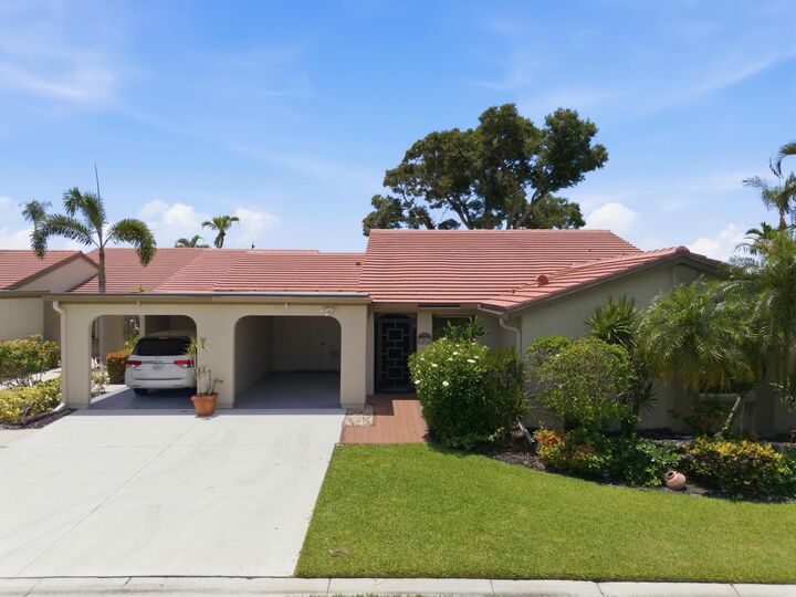 Property Photo:  5896 Forest Grove Drive 4  FL 33437 