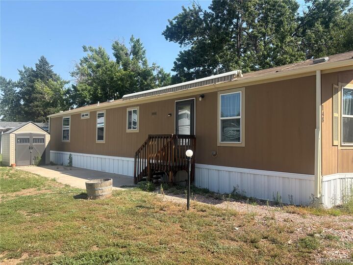 Property Photo:  3650 S Federal Boulevard  CO 80110 