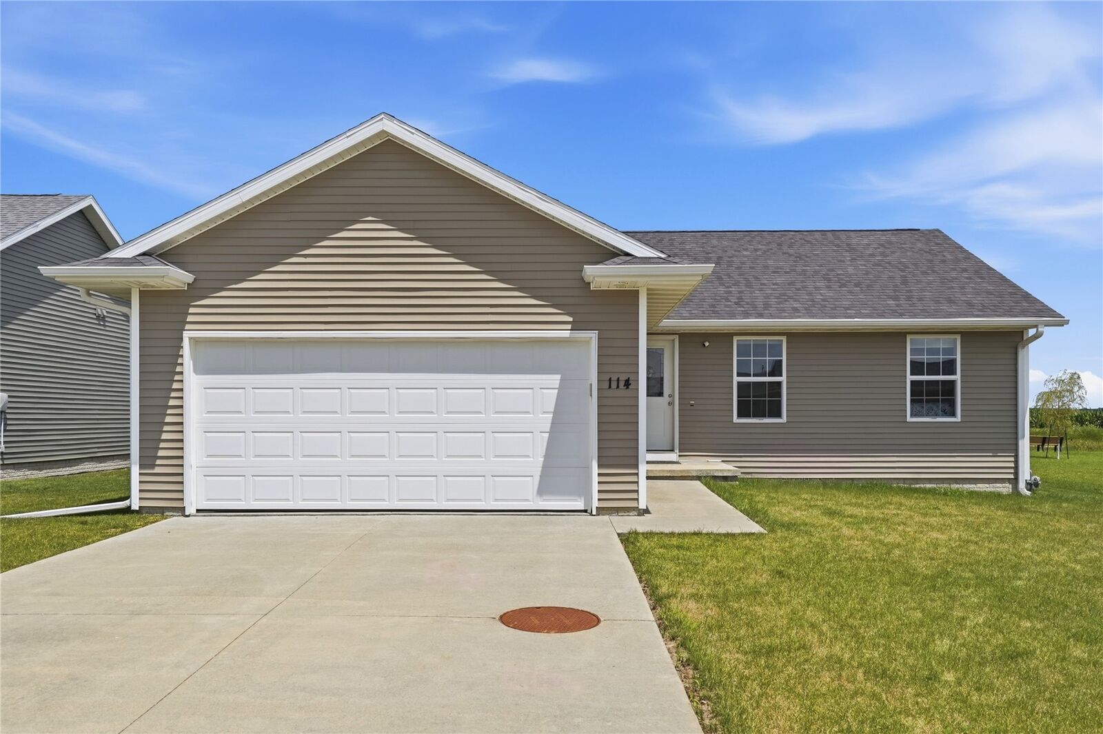 Property Photo:  114 Blue Jay Avenue  IA 52349 