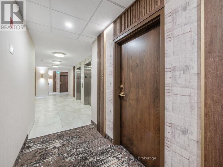 Property Photo: 1 Maison Parc Court 215 ON L4J 9K1