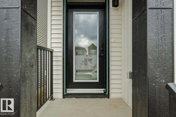 Property Photo: 7450 Klapstein Crescent SW AB T6W 5N8