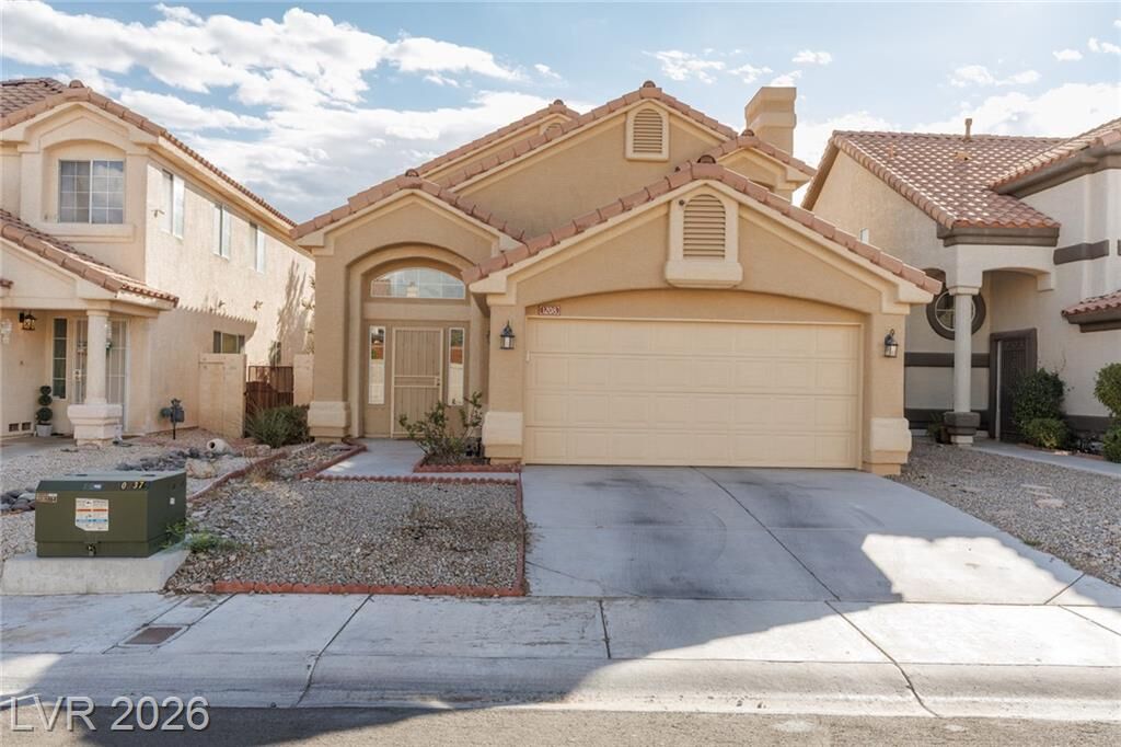 Property Photo: 1208 Barton Green Drive NV 89128