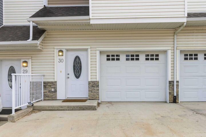 Property Photo:  180 Riverstone Ridge 30  AB T9K 0V6 
