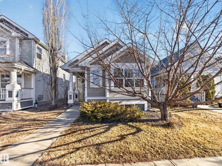 Property Photo:  7912 10 Avenue SW  AB T6X 1E7 