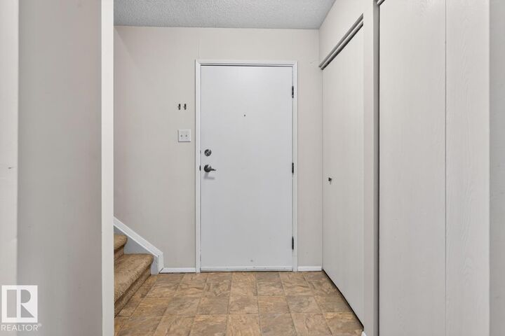 Property Photo: 237 Woodvale Road NW 106 AB T6L 1G7