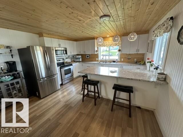 Property Photo: 5013 53 Avenue AB T0E 2K0