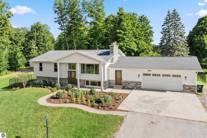 Property Photo:  3733 E Long Lake Road  MI 49685 