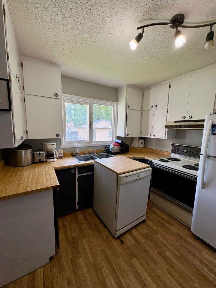 Property Photo: 4122 50 Street AB T4N 1W7