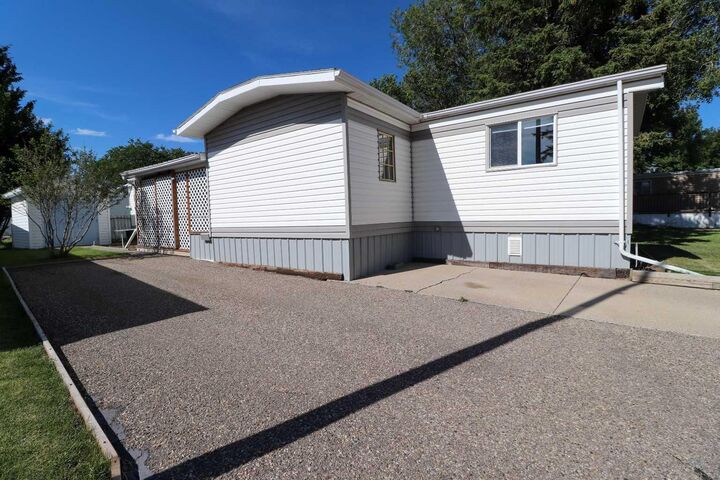 Property Photo:  2300 13 Street N 33  AB T1H 4E8 