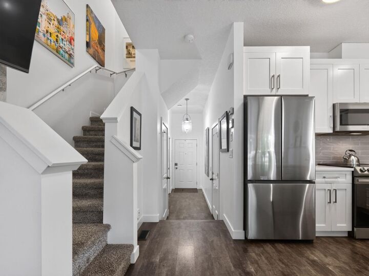 Property Photo:  404 Jumping Pound Common  AB T4C 2L1 