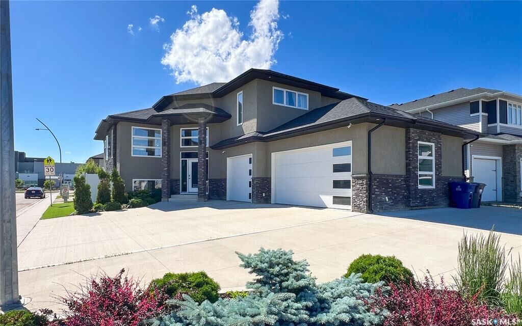 Property Photo: 202 Glacial Shores Cove SK S7W 0R7