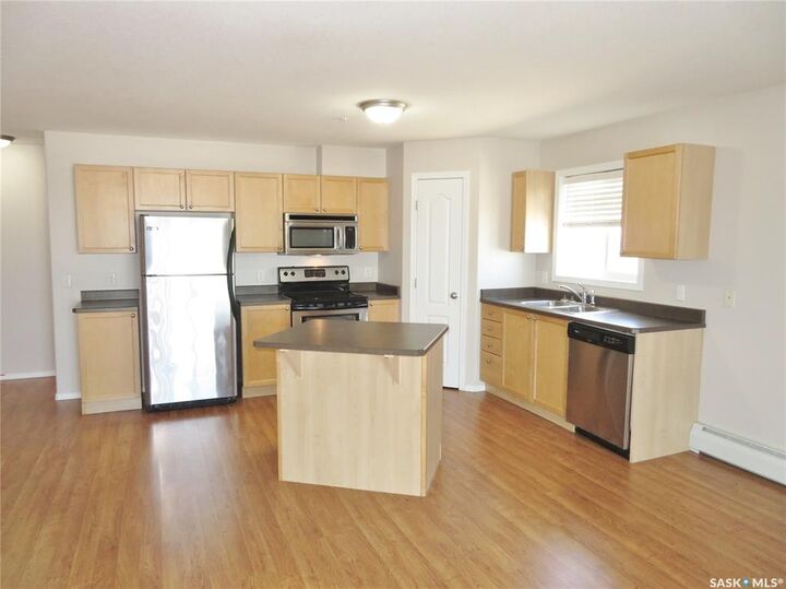 Property Photo: 100 1st Avenue N 214 SK S0K 0A1