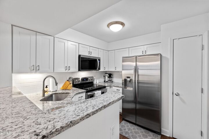 Property Photo:  1021 Wirewood Drive 202  NC 27605 