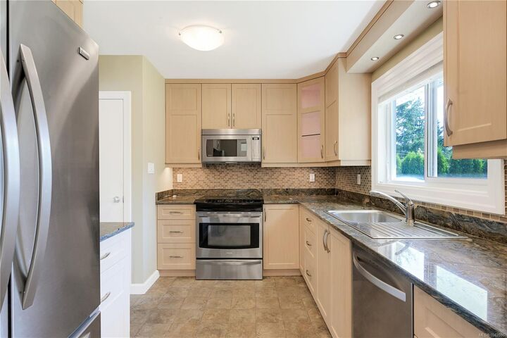 Property Photo:  3341 Rolston Cres  BC V8Z 4N9 