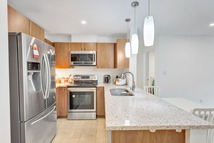 Property Photo: 6508 Denbigh Avenue 320 BC V5H 4W6
