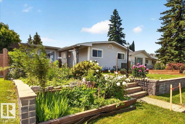 Property Photo: 5211 94A Avenue NW AB T6B 0Y6