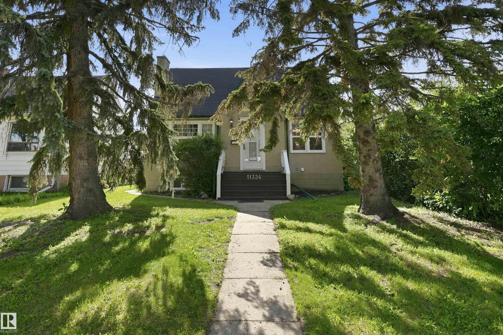Property Photo:  11334 104 Street NW  AB T5G 2K8 