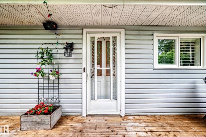 Property Photo:  7916 130 Avenue NW  AB T5C 1Y5 