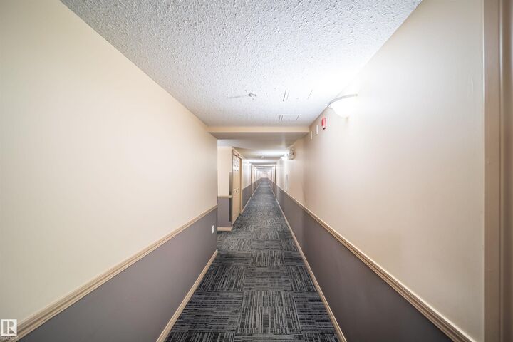 Property Photo: 40 Summerwood Boulevard 212 AB T8H 0C3