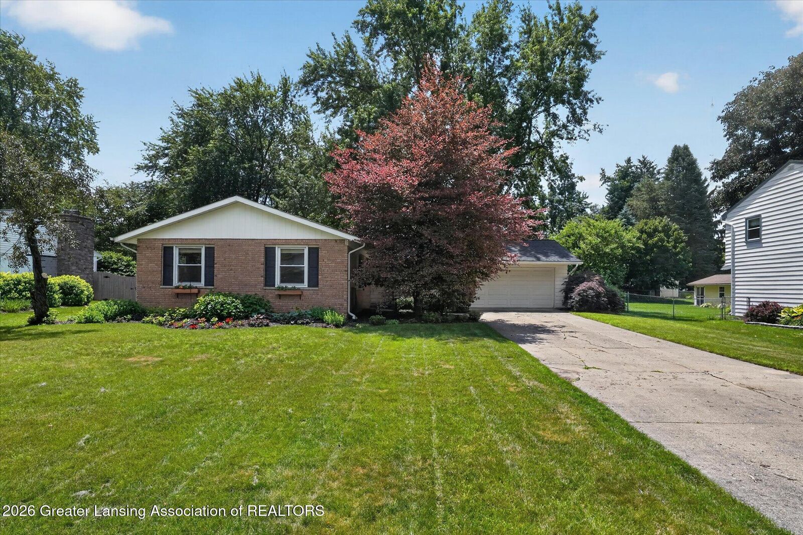Property Photo:  1625 Pebblestone Drive  MI 48864 