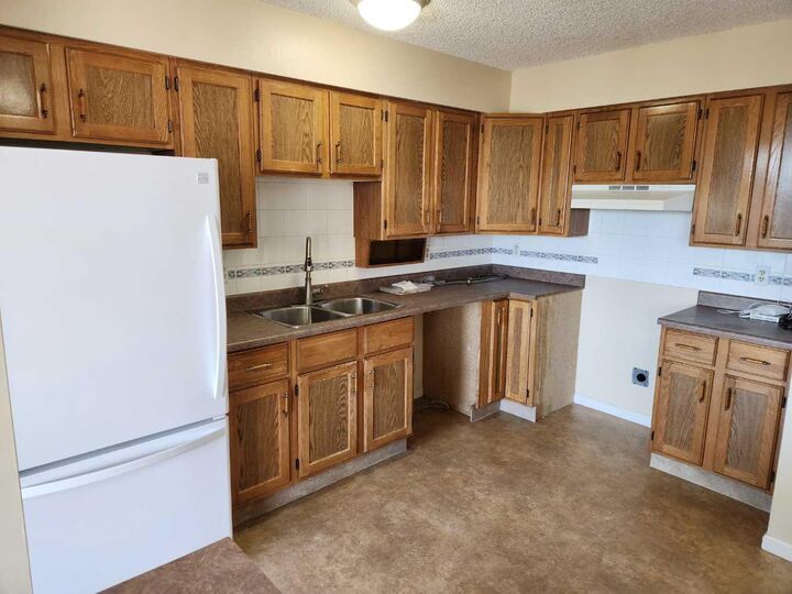 Property Photo: 80 Point McKay Crescent NW 1806 AB T3B 4W4