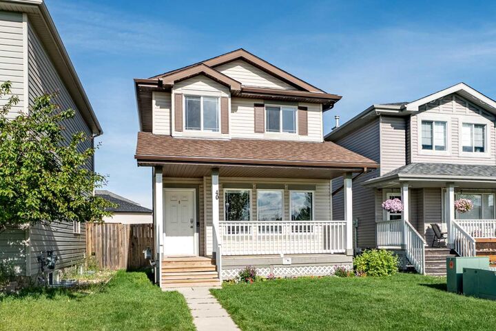 Property Photo:  40 Cimarron Grove Drive  AB T1S 2H1 