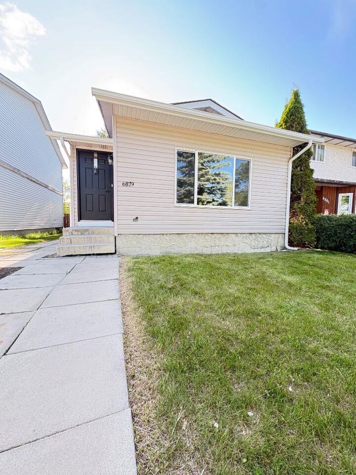 Property Photo:  6879 Rundlehorn Drive NE  AB T1Y 4P2 