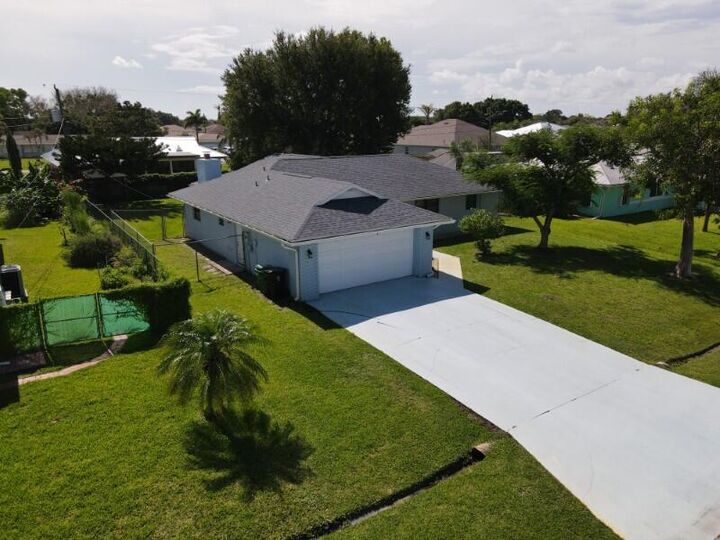 Property Photo: 1841 SE Camden Street FL 34952