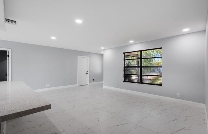 Property Photo:  1661 NW 1st Avenue  FL 33060 