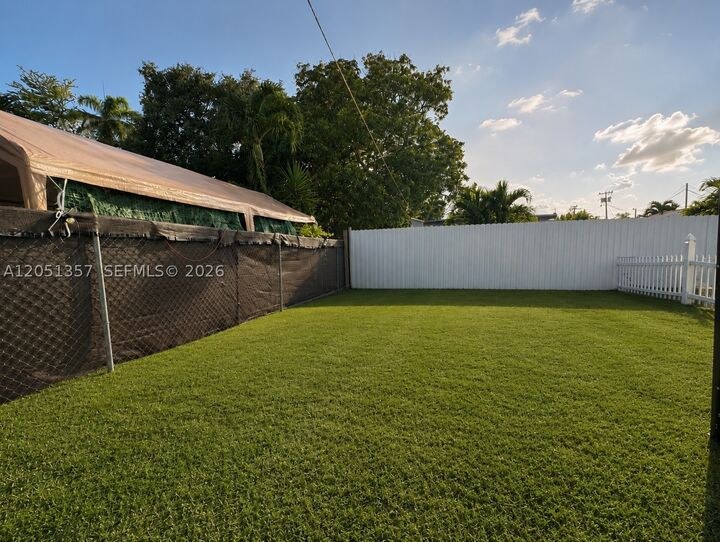 Property Photo:  610 NW 23rd Pl Front  FL 33125 