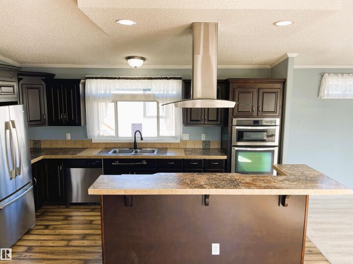 Property Photo:  #1 5102 51 Avenue  AB T0A 1H0 