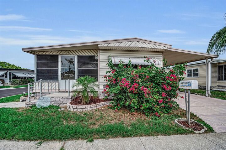 Property Photo: 10539 Tahitian Lane 112 FL 33773