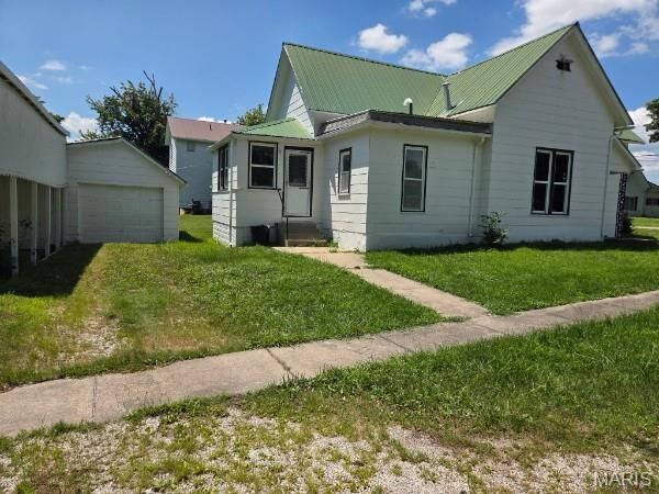 Property Photo: 113 E Cleveland Street MO 63456