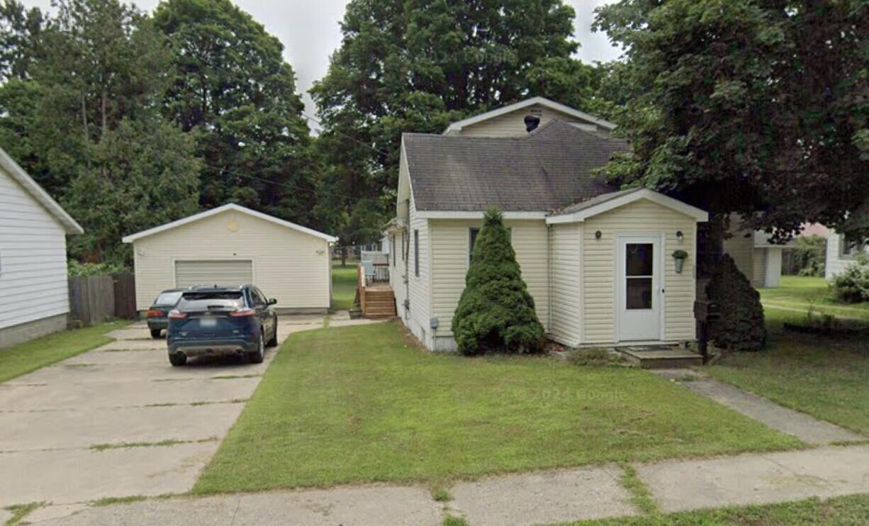 Property Photo: 229 W North Avenue MI 49677