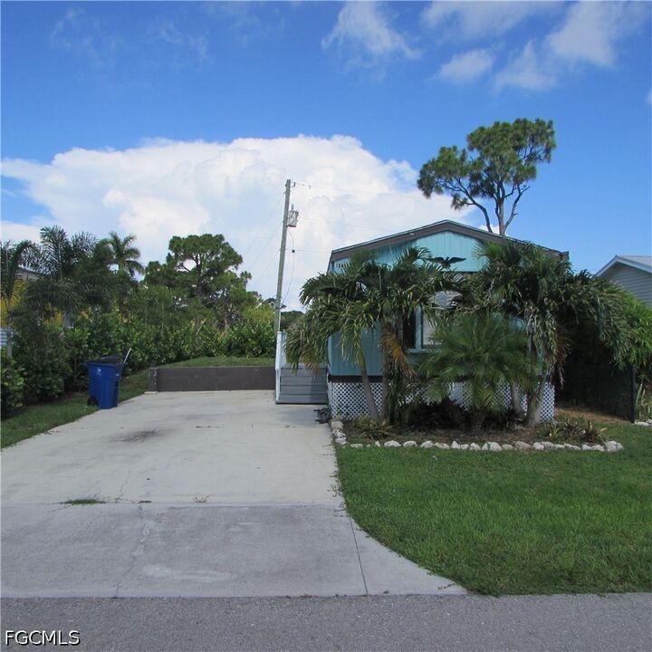 Property Photo:  10419 Trotwood Avenue  FL 33956 