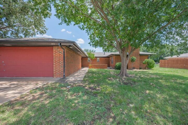 Property Photo: 1411 N Hartford Street 1411 &Amp 1413 OK 74075