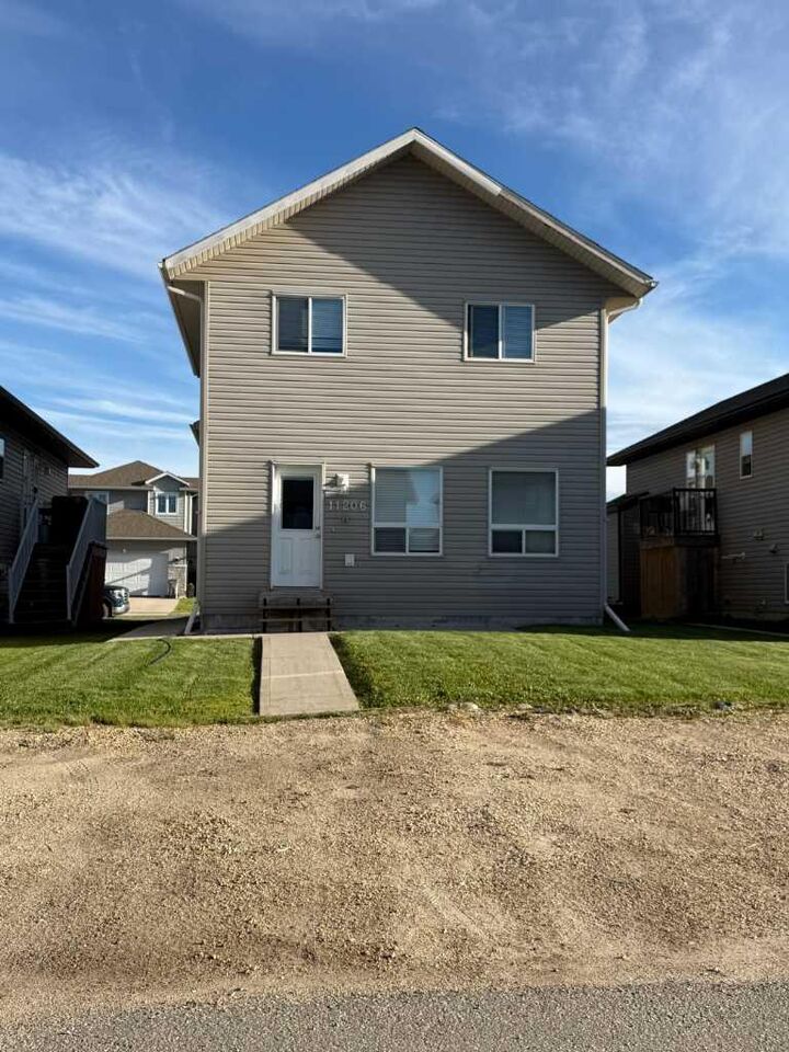 Property Photo: 11206 75A Avenue AB T8W 0G5